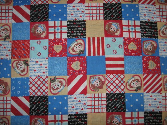 Image 0 of Raggedy Ann Andy patchwork red blue squares hearts cotton fabric by the yard