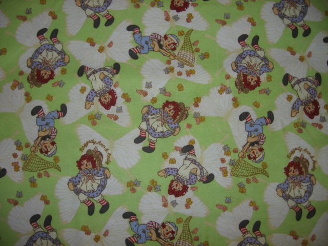 Image 0 of Raggedy Ann Andy butterflies green flannel Fabric by the Yard