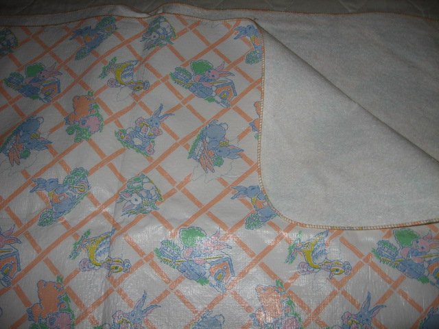 Image 0 of Vintage looking rabbits ducks sheep vinyl pink table cover