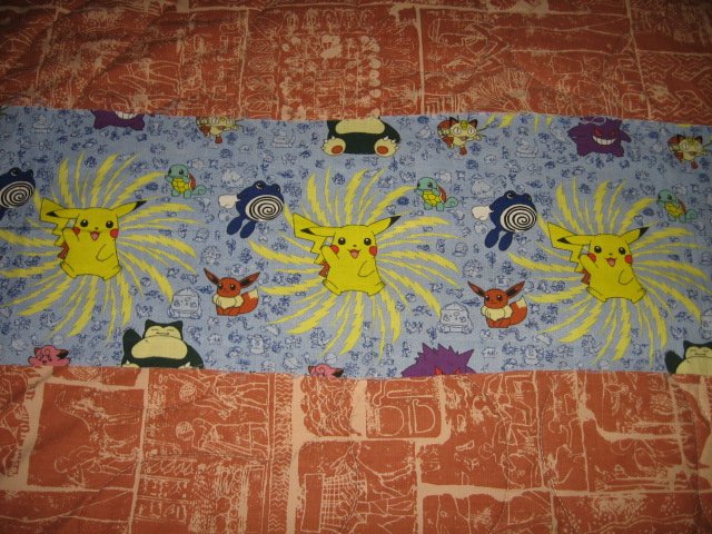 Image 0 of Pokemon Piachu vintage collectable outt of print fabric 9 inch by 44 inch