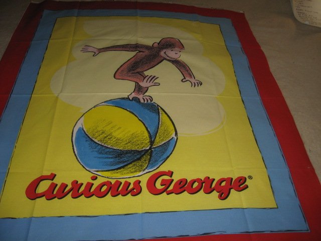 Curious George on Beachball fabric panel blue red border