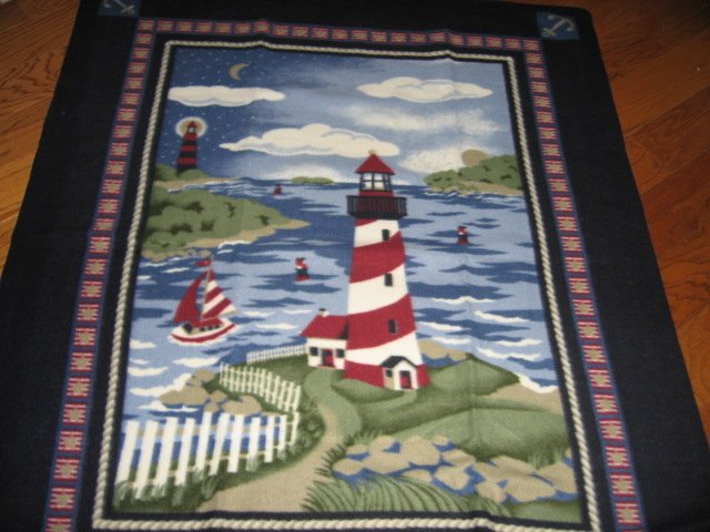 Image 0 of Ocean Lighthouse Sailboat fleece blanket  ocean waves  