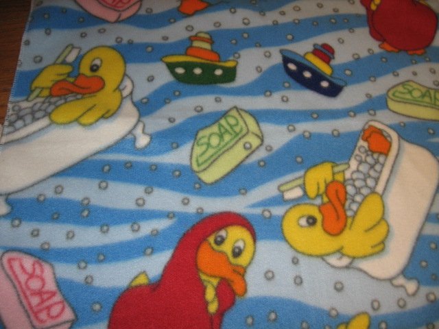 duckies taking bath fleece fabric