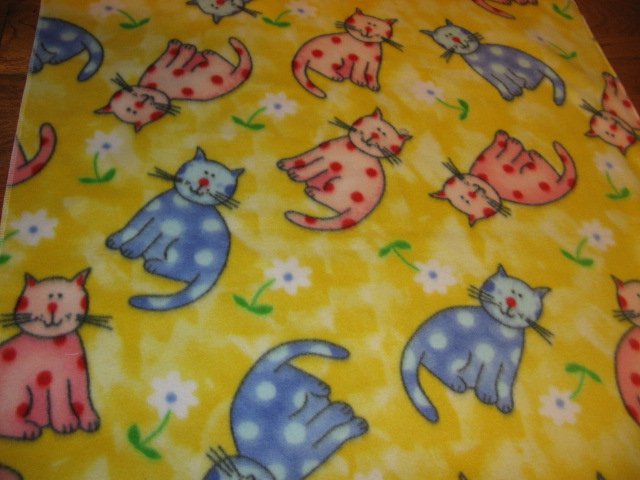  spotted colorful cats on fleece fabric