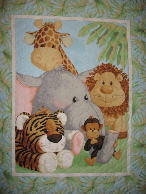 Image 0 of Lions Tigers Monkeys Giraffes Patty Reed double sided crib quilt/