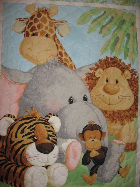 Image 1 of Lions Tigers Monkeys Giraffes Patty Reed double sided crib quilt/