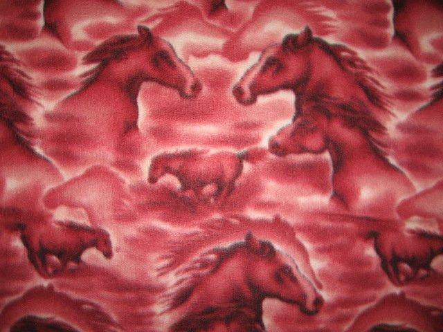Horse heads on cranberry fleece bed blanket 72
