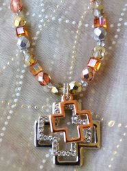 Thumbnail of Apricot Trinity Cross Necklace