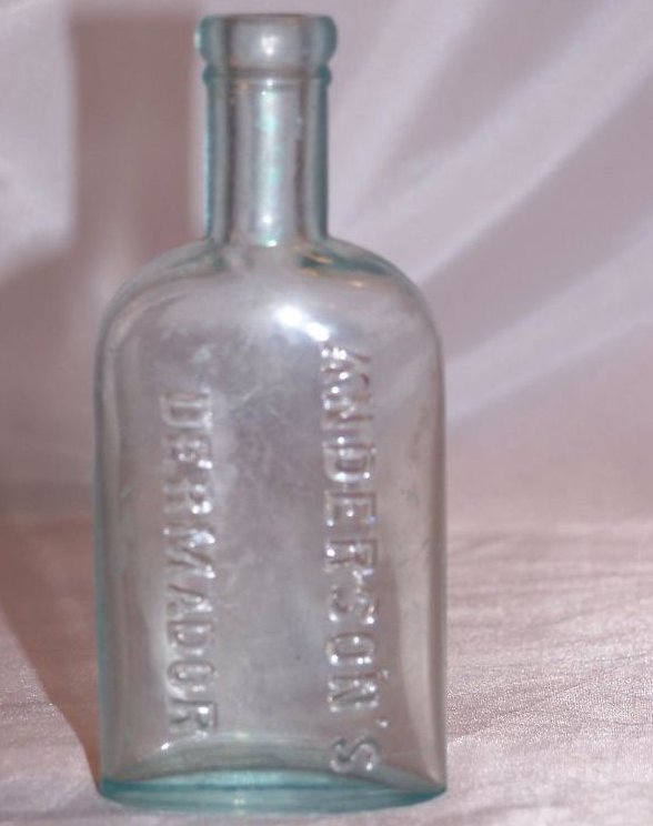 Anderson's Dermador Light Blue Glass Bottle Approx 1800