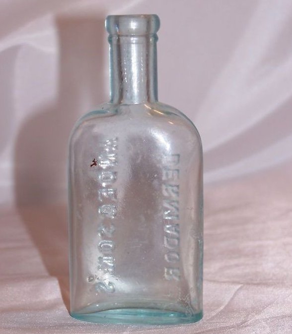 Image 2 of Anderson's Dermador Light Blue Glass Bottle Approx 1800