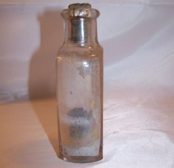 Image 1 of Black Cat Antique Bottle, Cork and Residue, Approx 1875