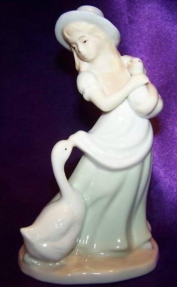 Playful Goose with Girl and Gosling Figurine