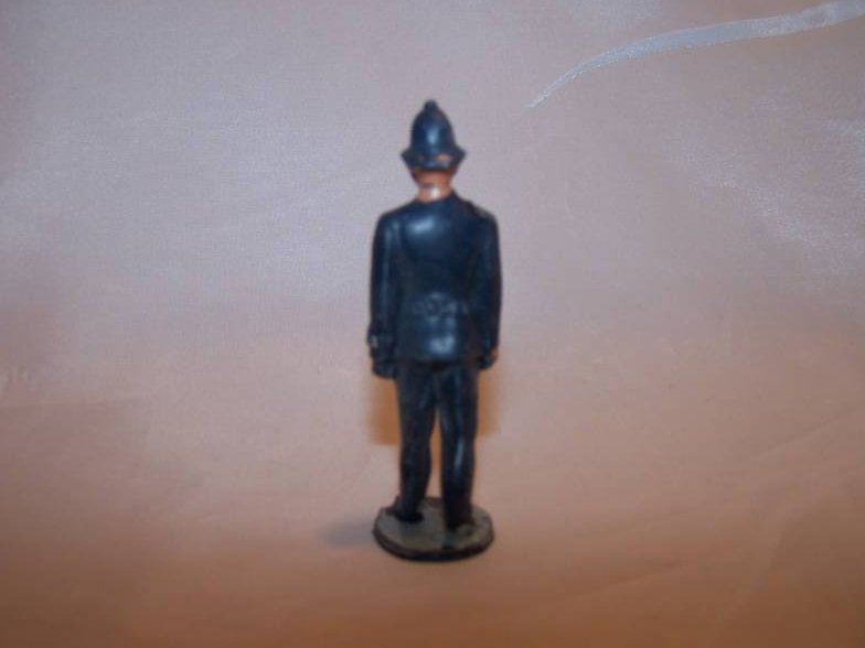 Image 2 of Toy Plastic London Bobby Police Officer in Mid-Stride