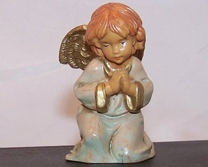 Image 0 of Angel Kneels in Prayer, Italy