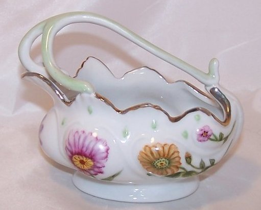 Flowing Floral Basket with Artistic Stylized Handle