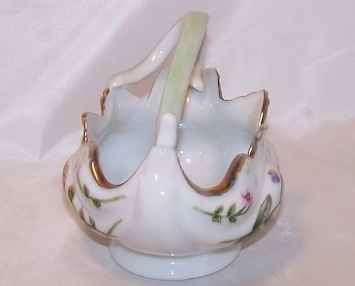 Image 1 of Flowing Floral Basket with Artistic Stylized Handle