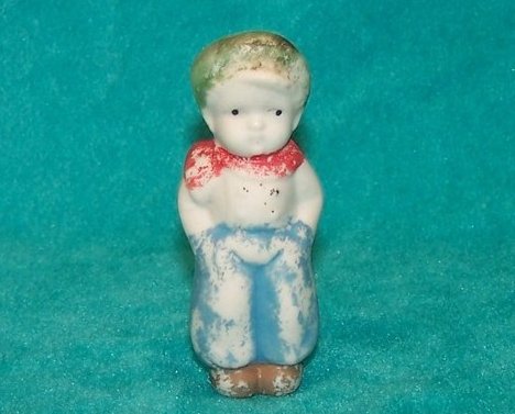 Boy in Blue Ceramic Figurine