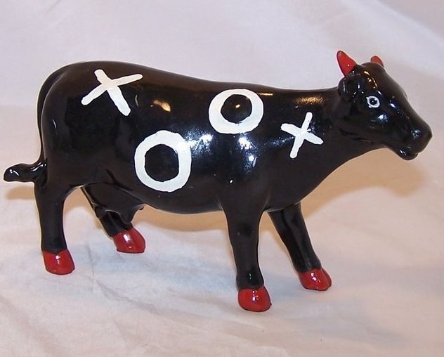 Image 0 of Tic Tac Toe Black Cow Figurine