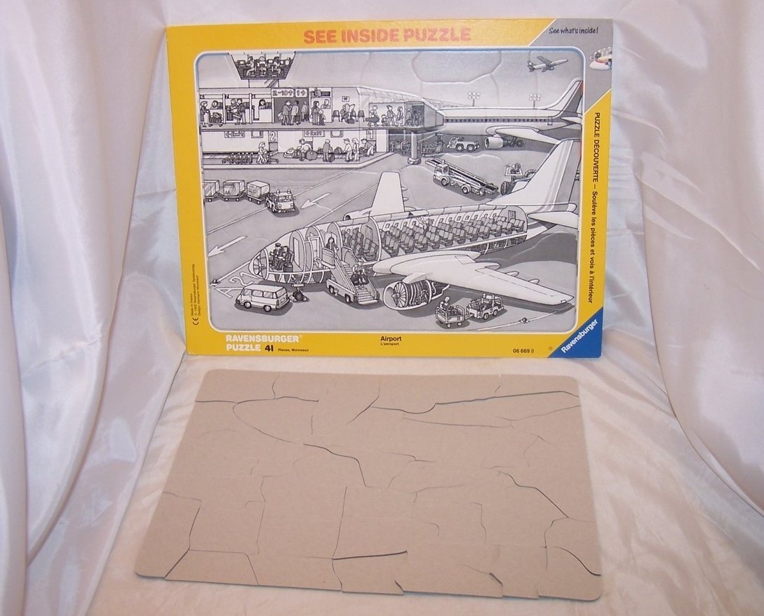 Image 1 of Ravensburger 41 Piece Airport See Inside Frame Puzzle