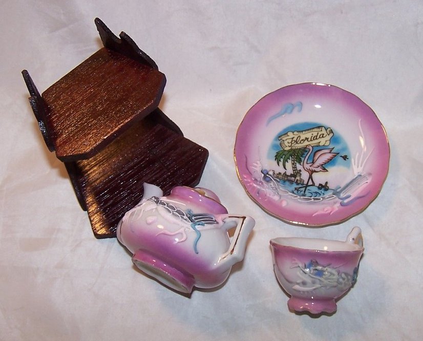 Image 1 of Dragonware Teacup, Saucer, and Teapot, Florida Souvenir