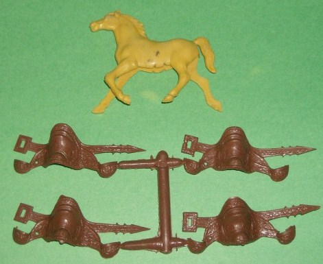 MPC Recast Set Of 12 Brown Plastic Western Saddles