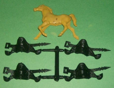 MPC Recast Set Of 12 Black Plastic Western Saddles