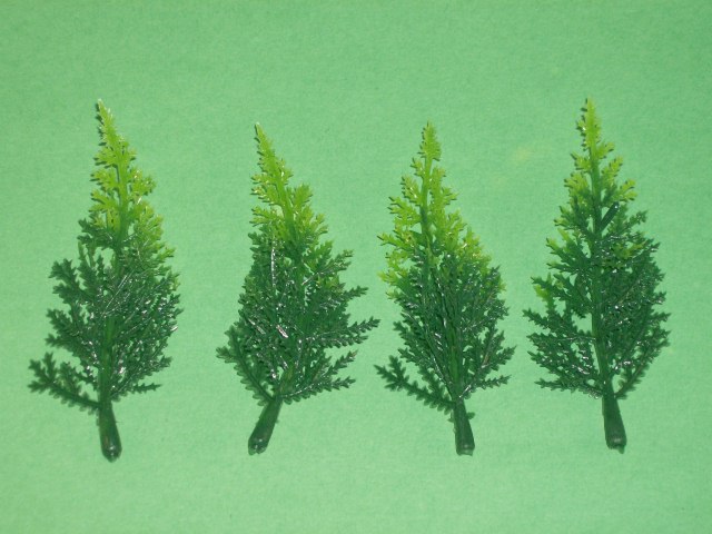 Set Of 4 Plastic Small Evergreen Trees