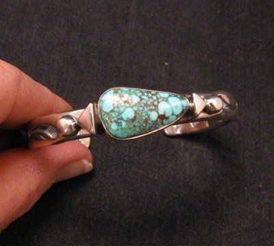 Image 1 of Orville Tsinnie Kingman Turquoise Stamped Silver Bracelet