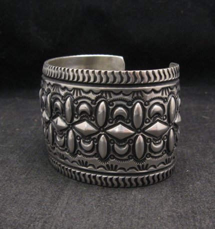Image 1 of  Wide Darryl Becenti Repousse Stamped Sterling Silver Bracelet
