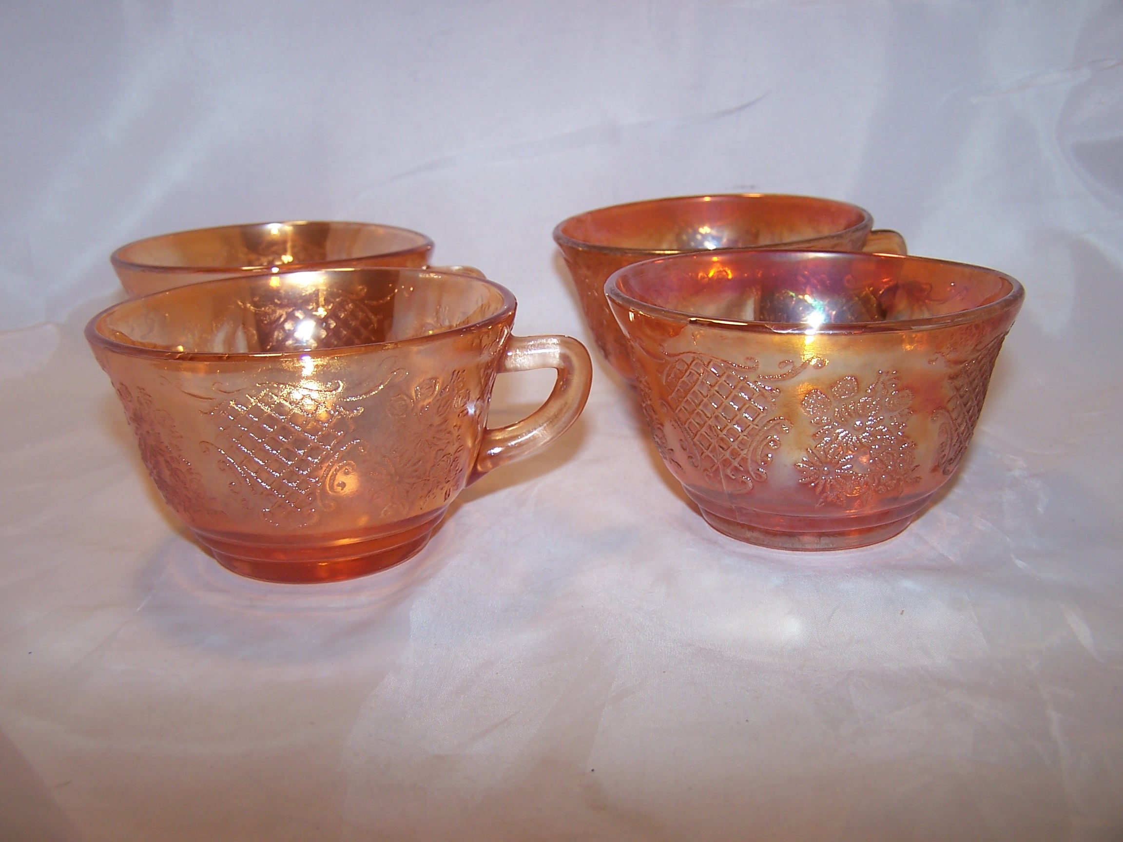 Image 3 of Marigold Carnival Glass Creamer and Cups, Flowers and Lattice Pattern