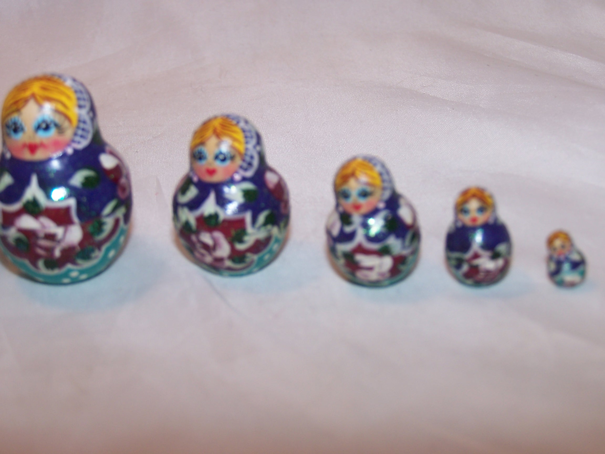 Image 1 of Nesting Doll in Purple, Teal, 8 Levels, Wood