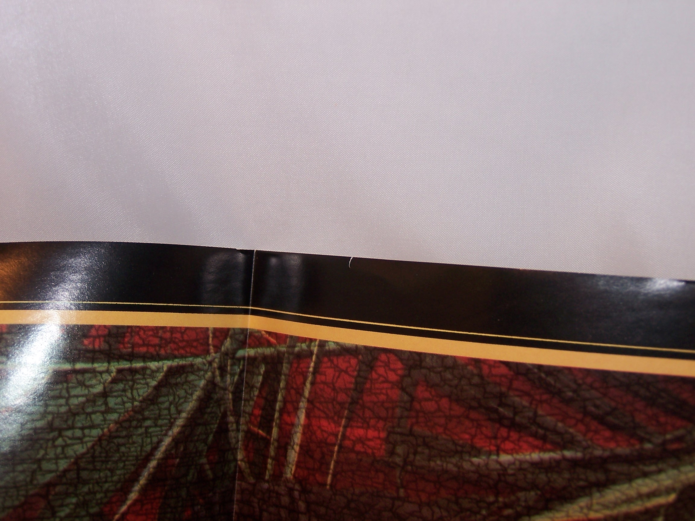 One tiny tear on poster edge