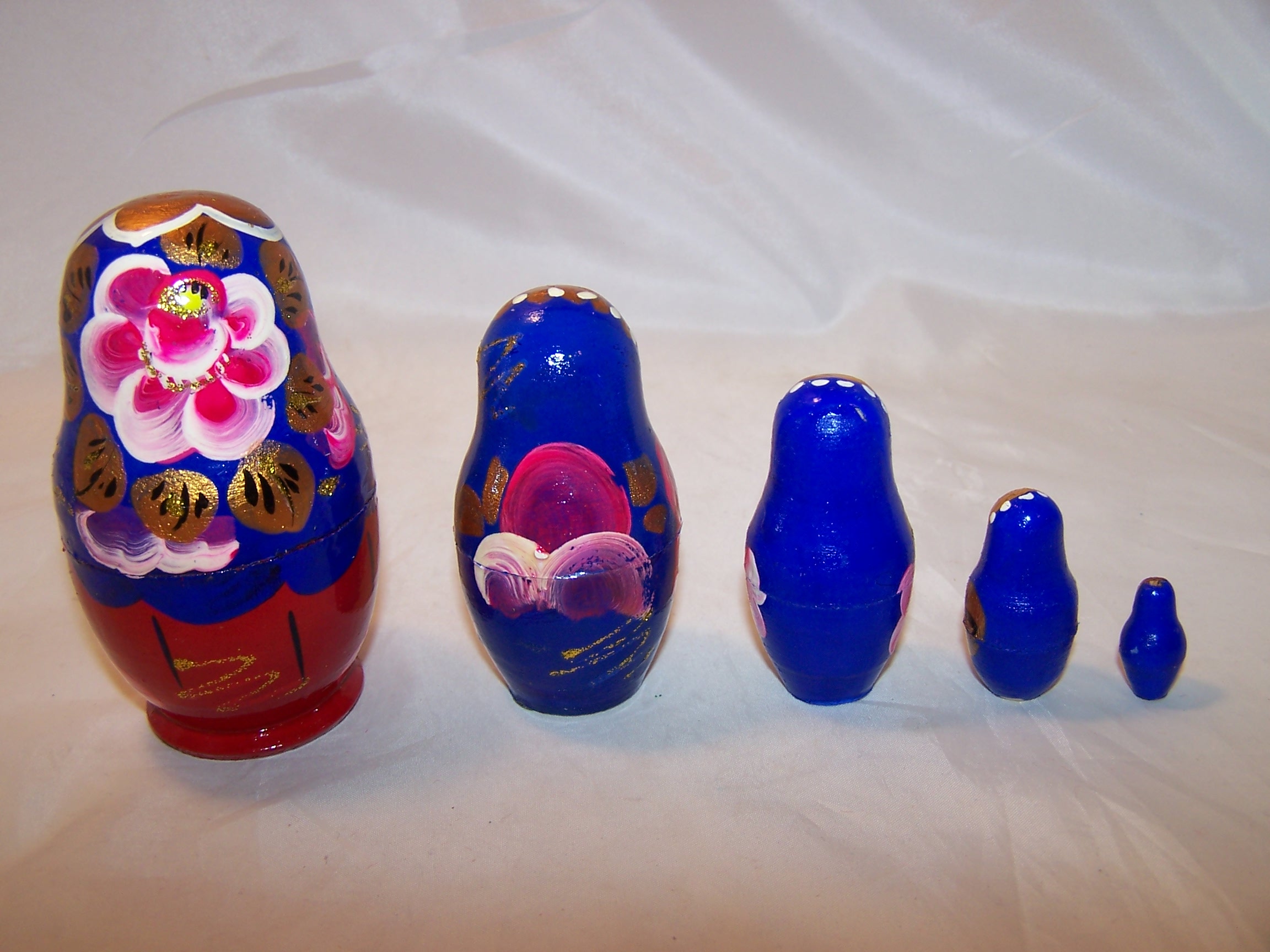 Image 1 of Nesting Doll in Blue, Gold, Pink, 5 Levels, Wood