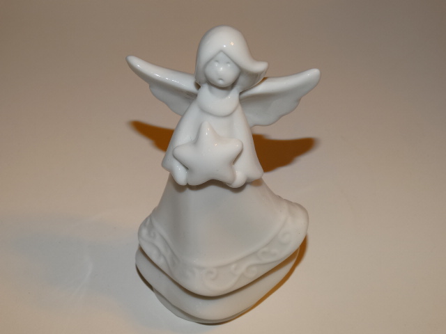Angel Holding Star, Porcelain