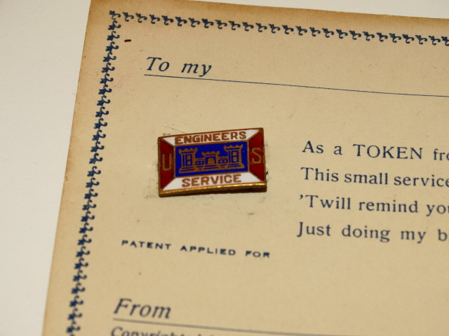 '.Twin Castle Towers on WWI Pin.'