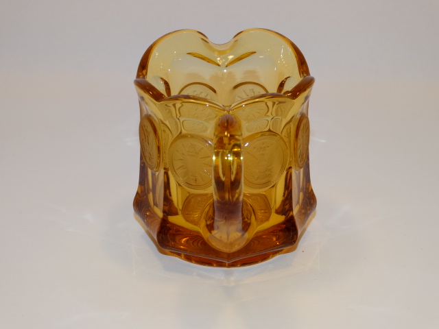 Image 1 of Coin Glass Amber Creamer Fostoria