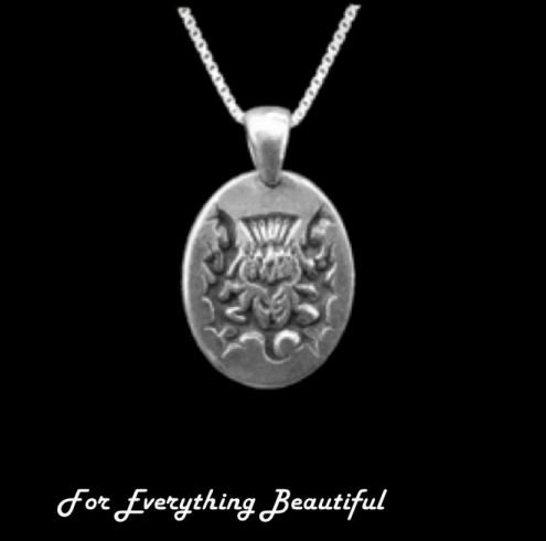 Image 0 of Thistle Design Engraved Oval Medium Sterling Silver Pendant