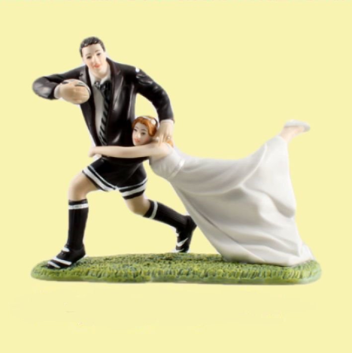 Image 0 of A Love Match Rugby Couple Hand Painted Porcelain Wedding Cake Topper