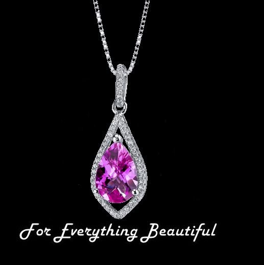 Image 0 of Pink Sapphire Teardrop Cut Cubic Zirconia Border Sterling Silver Pendant