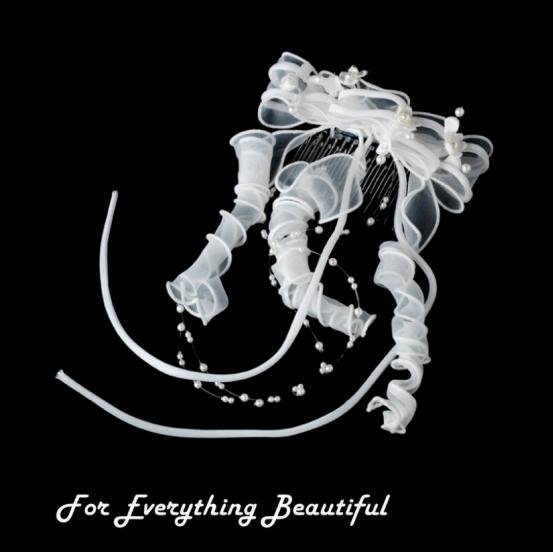 Image 0 of White Bows Pearl Strands Flowergirl Child Tiara Comb