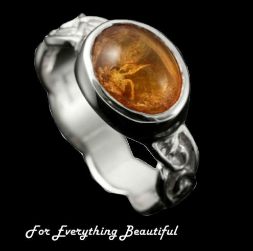 Image 0 of Muckle Roe Celtic Knot Oval Amber Ladies Sterling Silver Band Ring Sizes R-Z