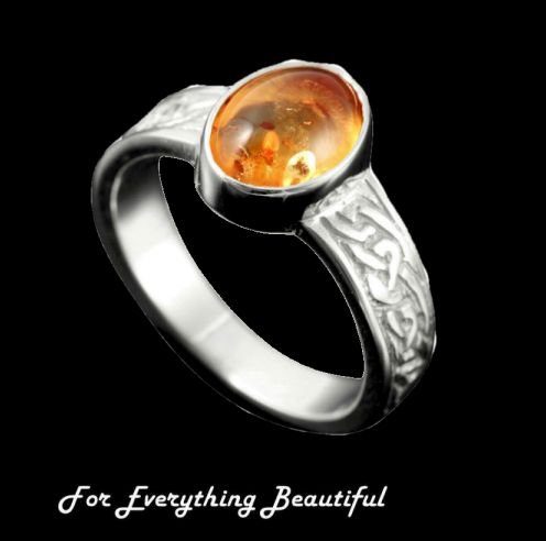 Image 0 of Uyea Celtic Knot Oval Amber Ladies Sterling Silver Band Ring Sizes A-Q