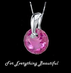 Pink Sapphire Spherical Cut Cubic Zirconia Accent Sterling Silver Pendant