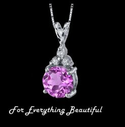Pink Sapphire Round Cut Triple Cubic Zirconia Accent Sterling Silver Pendant