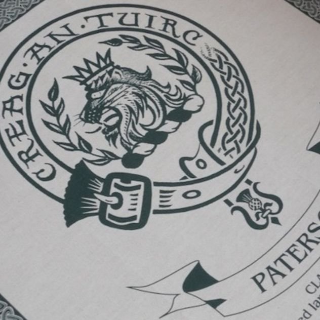 Image 1 of Paterson Clan Cloot Crest Unbleached Cotton Printed Tea Towel