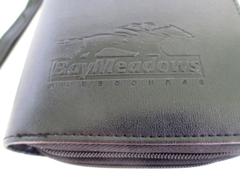 Never used Daytimer type personal planner. Embossed with the Bay Meadows Horse Racing Track logo. Many pockets, sleeves, and storage areas.