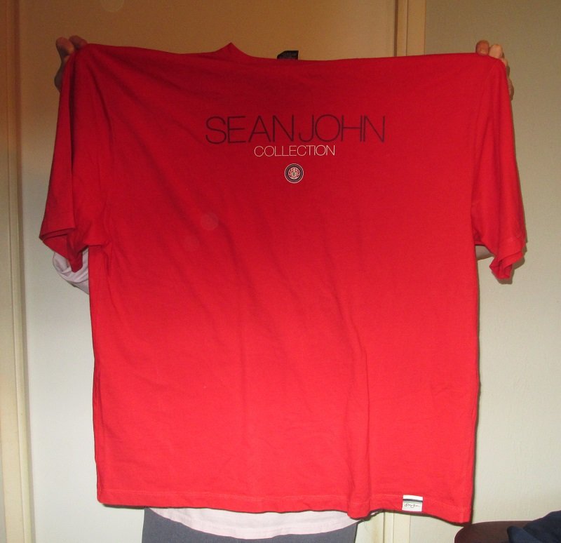 Men's size 2XL Sean John red short sleeve t-shirt. 100% cotton. Appears to have never been worn but has no tags. 