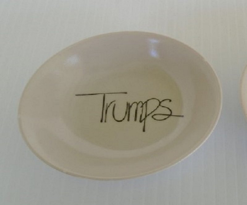 2 dishes from Los Angeles Restaurant named Trumps located on Melrose. Upscale with many Hollywood notables dining there. 4 inches. Estate purchase.