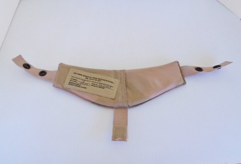 Military issue body armor. Throat protector with ballistic panel insert. 8470-01-491-8477 dated September 2004. Stated to be un-used.