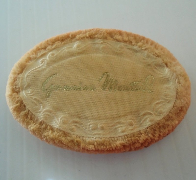 Germaine Monteil compact with mirror, puff, and powder. Vintage, possibly from the 1940s. Excellent, almost like new condition. Estate purchase.